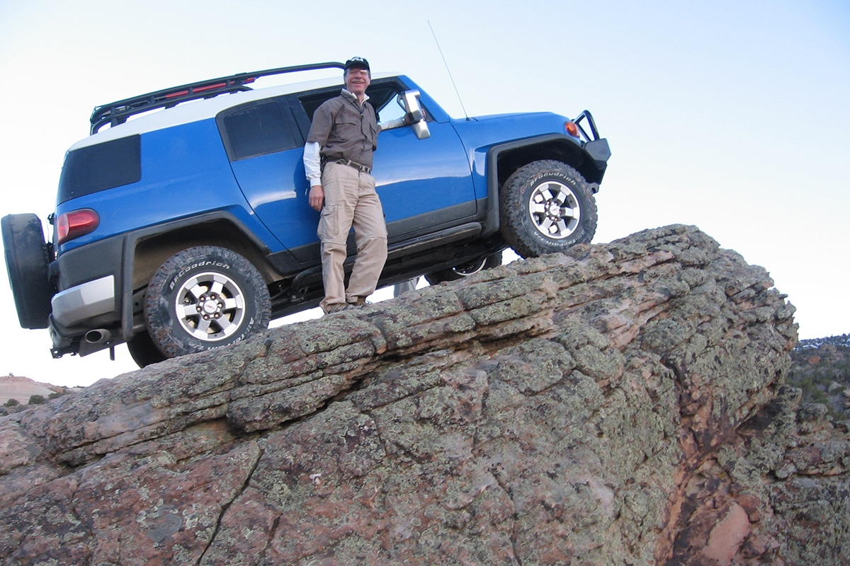 Self-portrait of the author with a Toyota FJ Cruiser prototype.
(photo by Paul M. Williamsen)