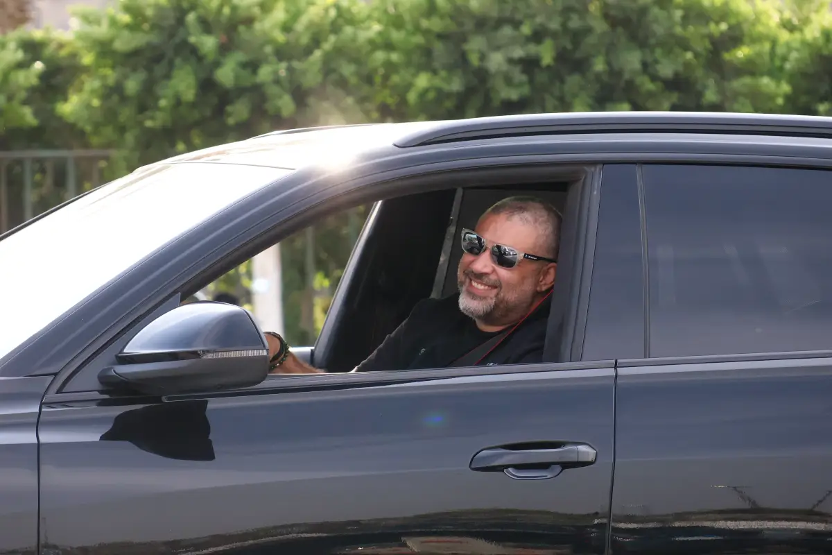 Happy driver on a Summer Road Trip. Photo Courtesy of Pexels: https://www.pexels.com/photo/man-smiling-in-black-car-driving-outdoors-35113495/