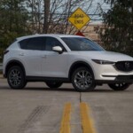 2021 Mazda CX-5 Signature AWD right front 3/4 view
