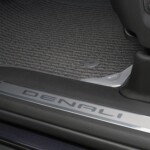 The Yukon Denali Ultimate features numerous Denali badges throughout, such as on the door's sill plate.