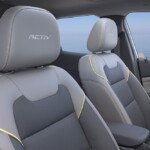 View of headrests in front cabin of Chevrolet Trax ACTIV with Jet Black with Artemis Accents Interior. Pre-production model shown. Actual production model may vary. Available in spring 2023. Cacti Green exterior color late availability.